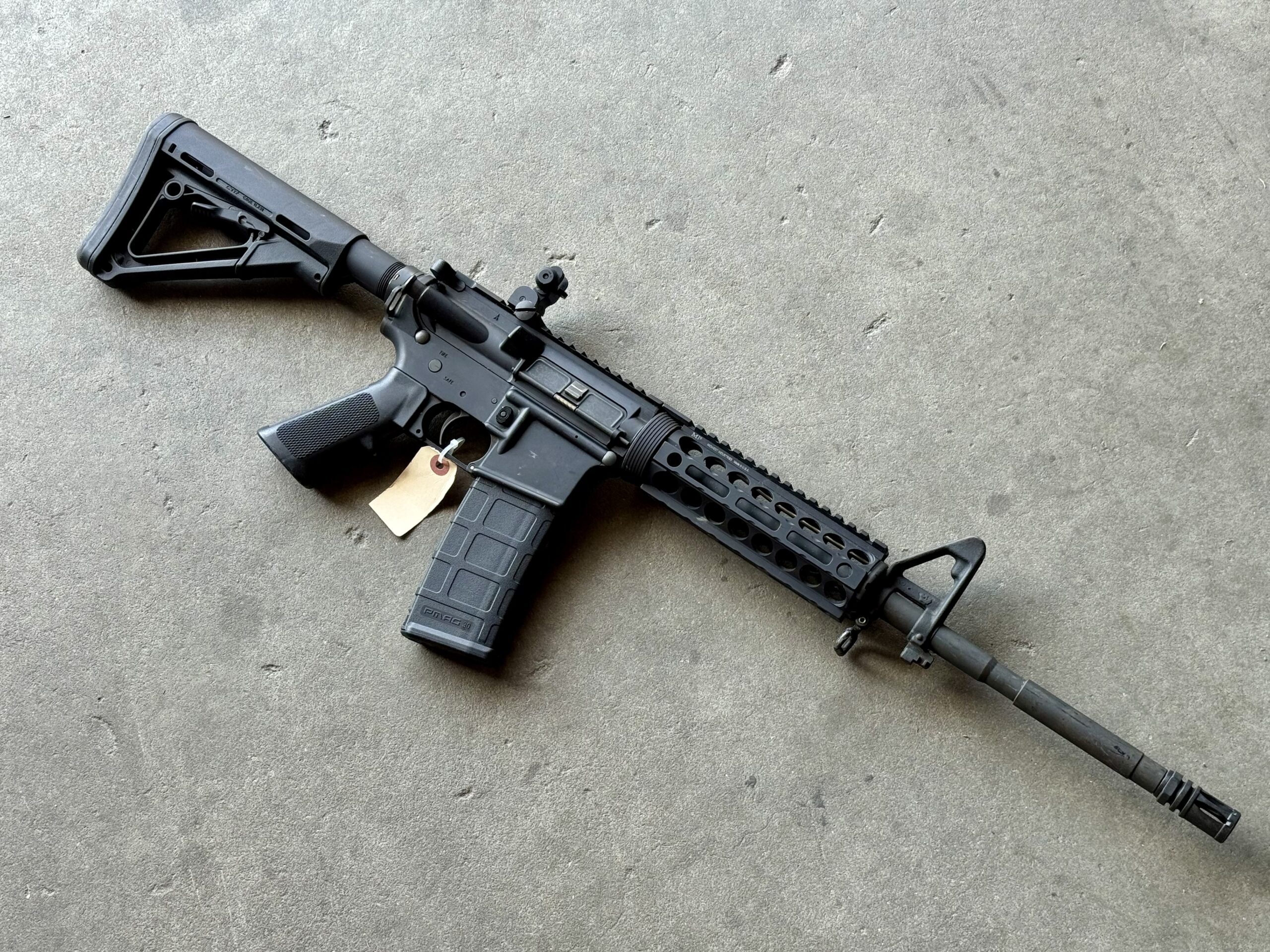 Bushmaster XM-15 E2S 5.56 16" MagPul CTR YHM Midwest Industries Police Trade