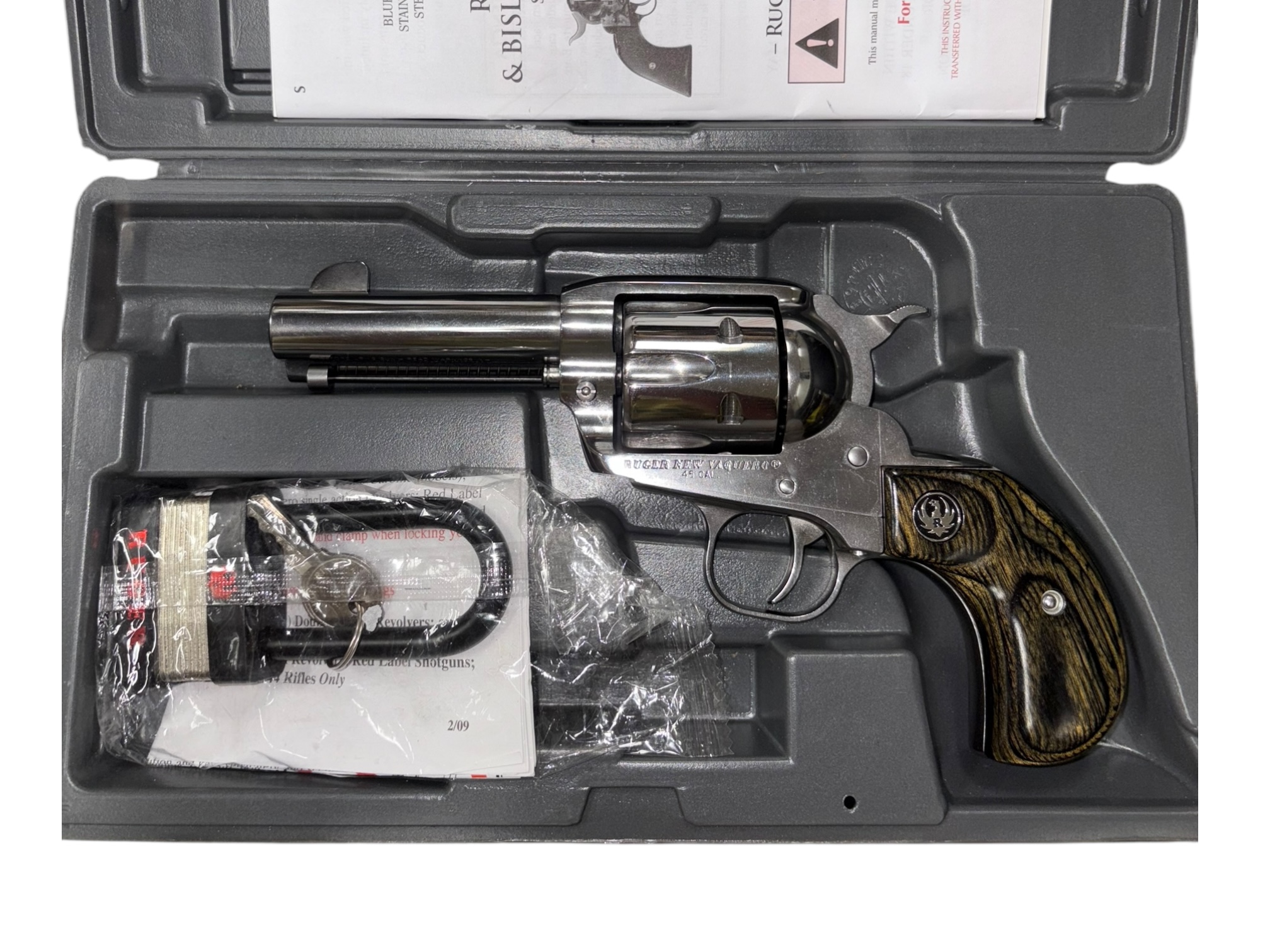Ruger New Vaquero Birdshead .45 Colt 3.75" – High-Polish Stainless, Black Laminate Grips (TALO)