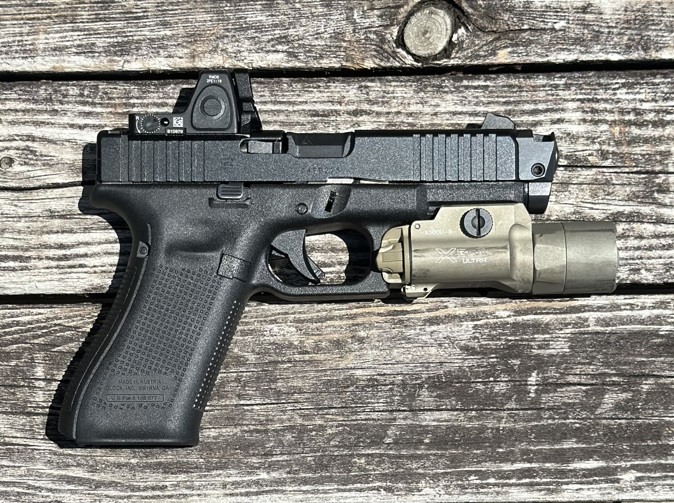 Used Glock 45 9mm W/ Trijicon RMR & Radian Afterburner Ramjet Surefire X300 Ultra